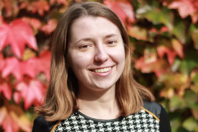 A portrait photo of a person with brown hair.